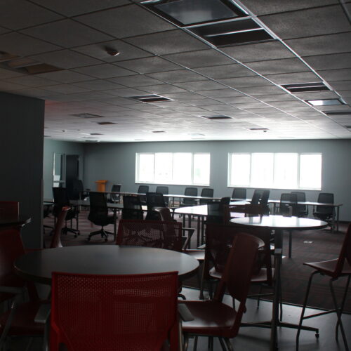 Receiving Area with many Chairs and Tables